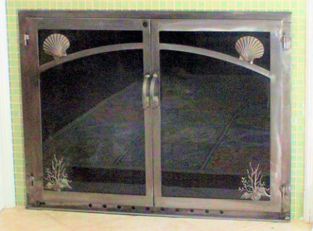 Pollock rip with shell and seagrass motif all natural iron finish with twin doors, comes with slide mesh spark screen